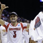 Louisville guard Peyton Siva celebrates after Louisville's 85-63 win over Duke in Midwest Regional final in the NCAA college basketball tournament, Sunday, March 31, 2013, in Indianapolis. (AP Photo/Darron Cummings)