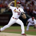 St. Louis Cardinals starter Adam Wainwright pitches against the Pittsburgh Pirates in the first inning of Game 5 of a National League baseball division series, Wednesday, Oct. 9, 2013, in St. Louis. (AP Photo/Charlie Riedel)