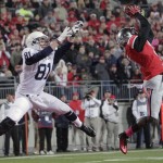  Ohio State defensive back Corey Brown, right, grabs an interception in the end zone in front of Penn State tight end Adam Breneman during the first quarter of an NCAA college football game Saturday, Oct. 26, 2013, in Columbus, Ohio. (AP Photo/Jay LaPrete)