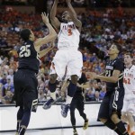  Illinois' Brandon Paul (3) shoots over Colorado's Spencer Dinwiddie (25) during the first half of a second-round game of the NCAA college basketball tournament Friday, March 22, 2013, in Austin, Texas. (AP Photo/Eric Gay)