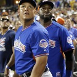 Miguel Cabrera of the Detroit Tigers, left, and David Ortiz of the Boston Red Sox watch a home run hit during the MLB All-Star baseball Home Run Derby, on Monday, July 15, 2013 in New York. (AP Photo/Kathy Willens)