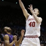 Indiana forward Cody Zeller (40) drives against James Madison guard A.J. Davis in the first half of a second-round game at the NCAA men's college basketball tournament, Friday, March 22, 2013, in Dayton, Ohio. (AP Photo/Al Behrman)