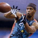 West Virginia receiver Tavon Austin makes a catch as he runs a drill at the NFL football scouting combine in Indianapolis, Sunday, Feb. 24, 2013. (AP Photo/Michael Conroy)