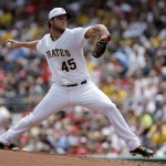 Pittsburgh Pirates starting pitcher Gerrit Cole delivers during the third inning of a baseball game against the Philadelphia Phillies in Pittsburgh on Thursday, July 4, 2013. (AP Photo/Gene J. Puskar)