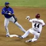 Arizona Diamondbacks' Paul Goldschmidt (44) is forced out by Toronto Blue Jays' Jose Reyes as he turns a double play on Eric Chavez during the seventh inning of a baseball game, Monday, Sept. 2, 2013, in Phoenix. (AP Photo/Matt York)