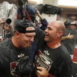 Arizona Diamondbacks manager Kirk Gibson, 
right, celebrates with pitcher J.J. Putz in the 
locker room after a baseball game against the 
San Francisco Giants, Friday, Sept. 23, 2011, 
in Phoenix. The Diamondbacks defeated the 
Giants 3-1 and became the 2011 National League 
West Champions. (AP Photo/Ross D. Franklin)