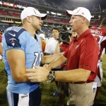 Tennessee Titans quarterback Jake Locker (10) is congratulated by Arizona Cardinals head coach Ken Whisenhunt after the Titans beat the Arizona Cardinals 32-27 in an NFL football preseason game on Thursday, Aug. 23, 2012, in Nashville, Tenn. Locker threw for 134 yards and two touchdowns in his home debut as the Titans' starting quarterback. (AP Photo/Joe Howell)