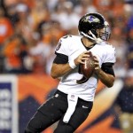 Baltimore Ravens quarterback Joe Flacco looks to throw in the rain against the Denver Broncos during the first half of an NFL football game, Thursday, Sept. 5, 2013, in Denver. (AP Photo/Jack Dempsey)