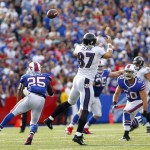 Baltimore Ravens tight end Dallas Clark (87) can't make the catch on a pass that was intercepted by Buffalo Bills middle linebacker Kiko Alonso (50) during the second half of an NFL football game on Sunday, Sept. 29, 2013, in Orchard Park, N.Y. Bills strong safety Da'Norris Searcy (25) helps defend on the play. Buffalo won 23-20. (AP Photo/Bill Wippert)