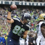 Seattle Seahawks' Zach Miller reacts after scoring his second touchdown reception against the Jacksonville Jaguars in the first half of an NFL football game on Sunday, Sept. 22, 2013, in Seattle. (AP Photo/Stephen Brashear)