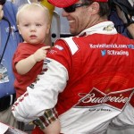 Kevin Harvick (29) holds his son Keelan in victory lane after winning the AdvoCare 500 NASCAR Sprint Cup Series auto race at Phoenix International Raceway, Sunday, Nov. 10, 2013, in Avondale, Ariz. (AP Photo/Ralph Freso)