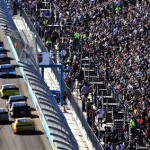 Drivers head into the first turn during a NASCAR Sprint Cup Series auto race at Phoenix International Raceway, Sunday, Nov. 11, 2012, in Avondale, Ariz. (AP Photo/Ross D. Franklin)