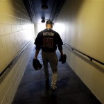 Atlanta Braves pitcher Tim Hudson makes his way to the field for a spring training baseball workout Saturday, Feb. 16, 2013, in Kissimmee, Fla. (AP Photo/David J. Phillip)
