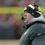  Green Bay Packers head coach Mike McCarthy watches the monitor during the first half of an NFL wild-card playoff football game against the San Francisco 49ers, Sunday, Jan. 5, 2014, in Green Bay, Wis. (AP Photo/Mike Roemer)
