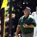 Craig Stadler flips his ball in the air after his hole-in-one on the first hole during the Par 3 competition before the Masters golf tournament Wednesday, April 6, 2011, in Augusta, Ga. (AP Photo/Chris O'Meara)