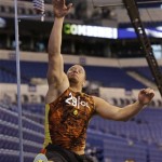 Oklahoma offensive lineman Lane Johnson goes through a drill during the NFL football scouting combine in Indianapolis Saturday, Feb. 23, 2013. (AP Photo/Dave Martin)
