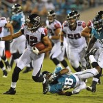  After catching a pass, Atlanta Falcons wide receiver Kevin Cone (12) breaks away from Jacksonville Jaguars cornerback Antwon Blake (38) on his way to a 49-yard touchdown during the second half of an NFL preseason football game on Thursday, Aug. 30, 2012, in Jacksonville, Fla. (AP Photo/Stephen Morton)