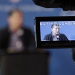 Detroit Lions head coach Jim Schwartz is captured on the screen of a video camera as he answers a question during a news conference at the NFL football scouting combine in Indianapolis, Thursday, Feb. 21, 2013. (AP Photo/Michael Conroy)