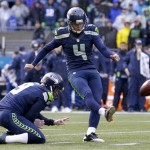Seattle Seahawks' Steven Hauschka, right, kicks a 38-yard field goal from the hold of Jon Ryan against the New Orleans Saints during the first quarter of an NFC divisional playoff NFL football game in Seattle, Saturday, Jan. 11, 2014. (AP Photo/Ted S. Warren)
