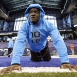 Iowa State linebacker Jeremiah George stretches on the field at the NFL football scouting combine in Indianapolis, Monday, Feb. 24, 2014. (AP Photo/Nam Y. Huh)