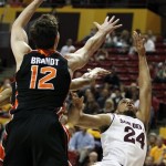 Arizona State's Trent Lockett (24) tries to get a shot over Oregon State's Angus Brandt (12) during the first half of an NCAA college basketball game Saturday, Jan. 14, 2012, in Tempe, Ariz.(AP Photo/Ross D. Franklin)