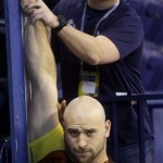 Oregon offensive lineman Kyle Long gets measured during the NFL football scouting combine in Indianapolis, Ind., Saturday, Feb. 23, 2013. (AP Photo/Dave Martin)
