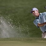 Matt Kuchar hits out of a bunker on the 16th hole during the third round of the Masters golf tournament Saturday, April 13, 2013, in Augusta, Ga. (AP Photo/Matt Slocum)
