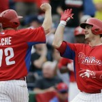 Philadelphia Phillies' Cody Asche, left, and Tommy Joseph celebrate after Joseph's two-run home run off New York Yankees' Zach Nuding during the seventh inning of an exhibition spring training baseball game, Tuesday, Feb. 26, 2013, in Clearwater, Fla. Philadelphia won 4-3. (AP Photo/Matt Slocum)