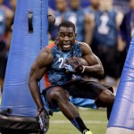 Wisconsin running back Montee Ball runs a drill at the NFL football scouting combine in Indianapolis, Sunday, Feb. 24, 2013. (AP Photo/Michael Conroy)