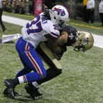 New Orleans Saints wide receiver Kenny Stills (84) pulls in a touchdown reception against Buffalo Bills defensive back Nickell Robey (37) during the second half of an NFL football game in New Orleans, Sunday, Oct. 27, 2013. (AP Photo/Bill Haber)