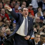 Duke coach Mike Krzyzewski yells to his team during the first half of an NCAA college basketball game against Kansas Tuesday, Nov. 12, 2013, in Chicago. (AP Photo/Charles Rex Arbogast)