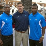 UCLA head coach Jim Mora, center is flanked by 
running back Johnathan Franklin, left ,and free 
safety Tevin McDonald, during the Pac-12 NCAA 
college football media day in Los Angeles, 
Tuesday, July 24, 2012. (AP Photo/Damian 
Dovarganes)