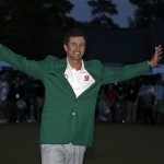 Adam Scott, of Australia, poses with his green jacket after winning the Masters golf tournament Sunday, April 14, 2013, in Augusta, Ga. (AP Photo/Darron Cummings)
