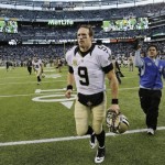  New Orleans Saints quarterback Drew Brees (9) runs off the field after an NFL football game against the New York Jets Sunday, Nov. 3, 2013, in East Rutherford, N.J. The Jets won the game 26-20. (AP Photo/Mel Evans)