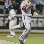 Arizona Diamondbacks' Patrick Corbin reacts as New York Mets' Anthony Recker runs the bases after hitting a home run during the fifth inning of a baseball game Tuesday, July 2, 2013, in New York. (AP Photo/Frank Franklin II)