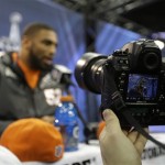 Denver Broncos' Wesley Woodyard answers a question during media day for the NFL Super Bowl XLVIII football game Tuesday, Jan. 28, 2014, in Newark, N.J. (AP Photo/Jeff Roberson)