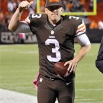 Cleveland Browns quarterback Brandon Weeden celebrates after the Browns' 37-24 win over the Buffalo Bills in an NFL football game Thursday, Oct. 3, 2013, in Cleveland. Weeden took over for injured starter Brian Hoyer in the first quarter. (AP Photo/David Richard)
