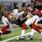 Atlanta Falcons' Dunta Robinson strips the ball from San Francisco 49ers' Michael Crabtree during the second half of the NFL football NFC Championship game Sunday, Jan. 20, 2013, in Atlanta. The Falcons recovered the fumble. (AP Photo/Mark Humphrey)