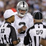 Oakland Raiders quarterback Carson Palmer (3) argues with the officials during the first half of a preseason NFL football game against the Arizona Cardinals, Friday, Aug. 17, 2012, in Glendale, Ariz. (AP Photo/Rick Scuteri)