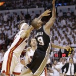 Miami Heat's Chris Andersen (11) defends against San Antonio Spurs' Tony Parker (9) during the first half in Game 7 of the NBA basketball championships, Thursday, June 20, 2013, in Miami. (AP Photo/Lynne Sladky)