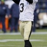 New Orleans Saints kicker Shayne Graham reacts after missing a field goal during the first quarter of an NFC divisional playoff NFL football game against the Seattle Seahawks in Seattle, Saturday, Jan. 11, 2014. (AP Photo/Ted S. Warren)