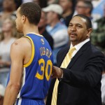 Golden State Warriors head coach Mark Jackson, right, consoles guard Stephen Curry as Curry is pulled late in their 107-100 loss to the Denver Nuggets in Game 5 of their first-round NBA basketball playoff series, Tuesday, April 30, 2013, in Denver. (AP Photo/David Zalubowski)