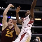 Stanford's Chasson Randle, right, goes up for a basket against Arizona State's Ruslan Pateev during the second half of an NCAA college basketball game at the Pac-12 Conference tournament in Los Angeles, Wednesday, March 7, 2012. (AP Photo/Jae C. Hong)