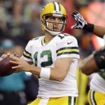 Green Bay Packers quarterback Aaron Rodgers sets to pass against the Seattle Seahawks in the first half of an NFL football game, Monday, Sept. 24, 2012, in Seattle. (AP Photo/Stephen Brashear)