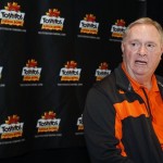 Oklahoma State defensive coordinator Bill Young answers reporters' questions concerning how to defend against Stanford quarterback Andrew Luck during a news conference prior to the Fiesta Bowl college football game Wednesday, Dec. 28, 2011 in Scottsdale, Ariz. Oklahoma State will play Stanford in the Fiesta Bowl Monday, Jan. 2. (AP Photo/Paul Connors)