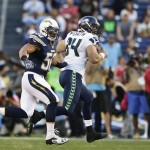 San Diego Chargers inside linebacker Manti Te'o chases Seattle Seahawks tight end Sean McGrath in the second quarter of an NFL preseason football game Thursday, Aug. 8, 2013, in San Diego. (AP Photo/Gregory Bull)