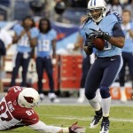 Tennessee Titans defensive back Michael Griffin, right, intercepts a pass intended for Arizona Cardinals tight end Jeff King (87) in the first quarter of an NFL football preseason game on Thursday, Aug. 23, 2012, in Nashville, Tenn. (AP Photo/Joe Howell)