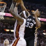 San Antonio Spurs center Boris Diaw (33) of France, blocks a shot to the basket by Miami Heat small forward LeBron James (6) during the first half of Game 6 of the NBA Finals basketball game, Tuesday, June 18, 2013 in Miami. (AP Photo/Lynne Sladky)