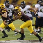  Arizona State safety Viliami Moeakiola intercepts the ball against the Northern Arizona during the first half of a football game on Thursday, Aug. 30 2012, in Tempe, Ariz. (AP Photo/Rick Scuteri)