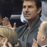 Actor Tom Cruise applauds as the Los Angeles Kings play the Chicago Blackhawks during the first period in Game 3 of the NHL hockey Stanley Cup playoffs Western Conference finals, Tuesday, June 4, 2013, in Los Angeles. (AP Photo/Mark J. Terrill)